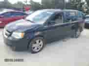 2011 Dodge Grand Caravan Crew with VIN 2D4RN5DG2BR606571, listed as a Copart auction lot 80439005 with 399,551 mi miles and Clean title. Bid and sale history available at DreamBid. Image 1.