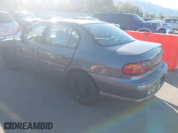 2005 Chevrolet Malibu Classic z VIN 1G1ND52F25M171916, wystawiony jako IAAI lot #42192421 z przebiegiem 165 936 mil mil oraz . Historia ofert i sprzedaży dostępna na DreamBid. Obrazek 3.