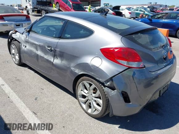 2015 Hyundai Veloster with VIN KMHTC6AD1FU238428, listed as a IAAI auction lot 43080780 with 51,449 mi miles and . Bid and sale history available at DreamBid. Image 3.