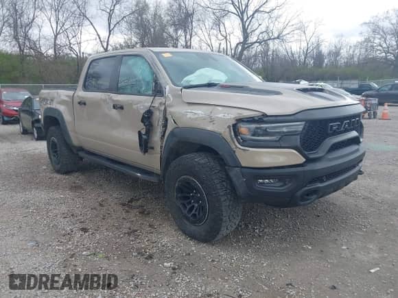 2022 Ram 1500 TRX with VIN 1C6SRFU95NN399791, listed as a IAAI auction lot 42040767 with 38,816 mi miles and . Bid and sale history available at DreamBid. Image 1.