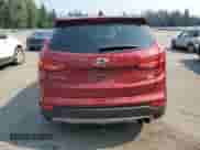 2014 Hyundai Santa Fe z VIN 5XYZUDLA4EG224106, wystawiony jako Copart lot #71776945 z przebiegiem 95 362 mil mil oraz Czysty tytuł • Clean title. Historia ofert i sprzedaży dostępna na DreamBid. Obrazek 6.