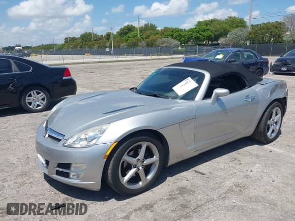2008 Saturn Sky with VIN 1G8MC35BX8Y128872, listed as a IAAI auction lot 42152153 with 62,022 mi miles and . Bid and sale history available at DreamBid. Image 2.