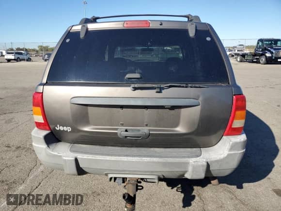 1999 Jeep Grand Cherokee Laredo с VIN 1J4GW58S9XC723378, выставлен на аукционе Copart как лот 90095705 с пробегом 177 816 миль миль и Чистый • Clean title. История ставок и продаж доступна на DreamBid. Изображение 6.