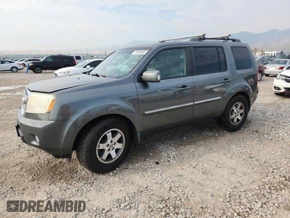 2009 Honda Pilot Touring with VIN 5FNYF48969B025883, listed as a Copart auction lot 70923065 with 192,552 mi miles and Salvage title. Bid and sale history available at DreamBid. Image 1.