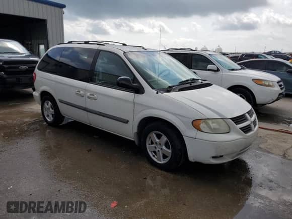 2007 Dodge Caravan SXT with VIN 1D4GP45R57B161051, listed as a Copart auction lot 58259765 with 105,658 mi miles and Salvage title. Bid and sale history available at DreamBid. Image 4.