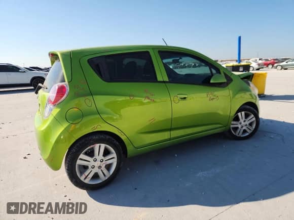 2014 Chevrolet Spark LS with VIN KL8CB6S94EC565436, listed as a Copart auction lot 86057295 with 106,927 mi miles and Salvage title. Bid and sale history available at DreamBid. Image 3.