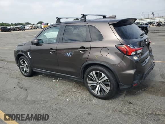 2021 Mitsubishi Outlander ES z VIN JA4ARUAU7MU005708, wystawiony jako Copart lot #80454945 z przebiegiem 59 245 mil mil oraz Szkoda całkowita • Salvage title. Historia ofert i sprzedaży dostępna na DreamBid. Obrazek 2.