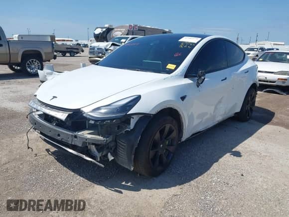 2023 Tesla Model Y Long Range z VIN 7SAYGDEE0PA178495, wystawiony jako IAAI lot #42507571 z przebiegiem 55 840 mil mil oraz . Historia ofert i sprzedaży dostępna na DreamBid. Obrazek 2.