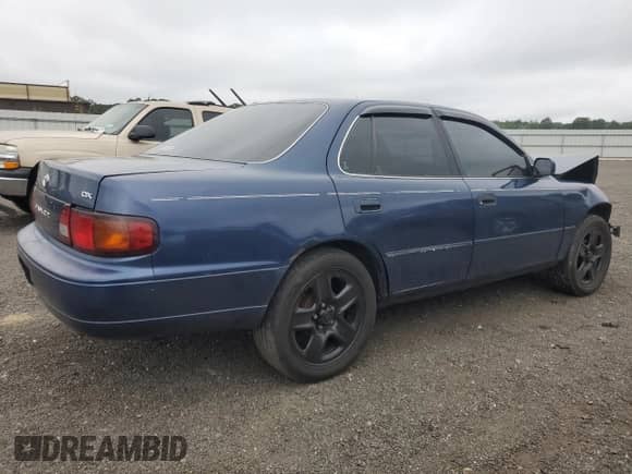 1995 Toyota Camry DX z VIN 4T1SK11EXSU477240, wystawiony jako Copart lot #68422685 z przebiegiem 146 403 mil mil oraz Szkoda całkowita • Salvage title. Historia ofert i sprzedaży dostępna na DreamBid. Obrazek 3.