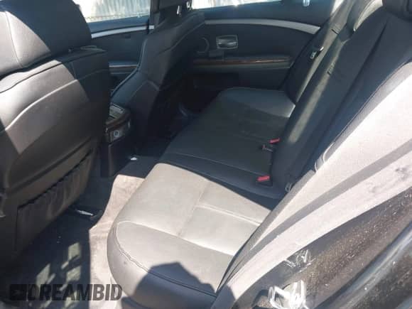 2007 BMW 7 Series 750i with VIN WBAHL83557DT08894, listed as a IAAI auction lot 42544687 with 122,529 mi miles and . Bid and sale history available at DreamBid. Image 8.