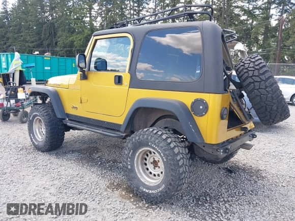 2003 Jeep Wrangler Rubicon с VIN 1J4FA69S93P302102, выставлен на аукционе IAAI как лот 42312951 с пробегом 146 408 миль миль и . История ставок и продаж доступна на DreamBid. Изображение 3.