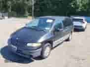 2000 Dodge Grand Caravan with VIN 1B4GP54G1YB559651, listed as a IAAI auction lot 40251476 with 145,034 mi miles and . Bid and sale history available at DreamBid. Image 2.