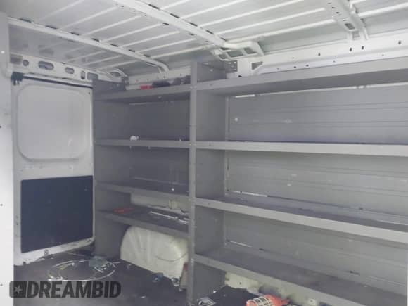 2023 Ram ProMaster Cargo z VIN 3C6LRVVG7PE559138, wystawiony jako IAAI lot #42331456 z przebiegiem 55 786 mil mil oraz . Historia ofert i sprzedaży dostępna na DreamBid. Obrazek 8.