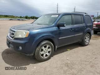2009 Honda Pilot Touring with VIN 5FNYF48939B049607, listed as a Copart auction lot 57707635 with 243,702 mi miles and Non repairable. Bid and sale history available at DreamBid. Image 1.