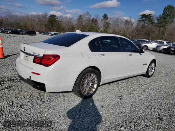 2015 BMW 7 Series 750Li xDrive with VIN WBAYF8C59FD655229, listed as a Copart auction lot 85693014 with 103,136 mi miles and Salvage title. Bid and sale history available at DreamBid. Image 3.