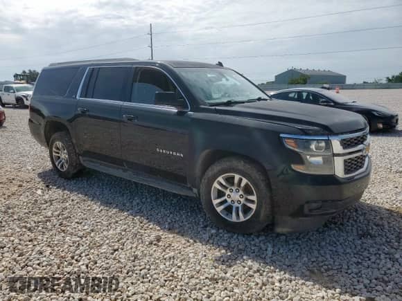 2015 Chevrolet Suburban LS с VIN 1GNSCHKC1FR235721, выставлен на аукционе Copart как лот 65287095 с пробегом Не указан миль и Списание • Salvage title. История ставок и продаж доступна на DreamBid. Изображение 4.