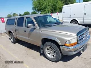 2004 Dodge Dakota SLT with VIN 1D7HL48N04S653798, listed as a IAAI auction lot 42520546 with 115,259 mi miles and . Bid and sale history available at DreamBid. Image 1.