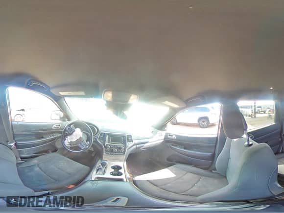 2016 Jeep Grand Cherokee Laredo with VIN 1C4RJFAG2GC489528, listed as a Copart auction lot 80066785 with 138,449 mi miles and Salvage title. Bid and sale history available at DreamBid. Image 16.