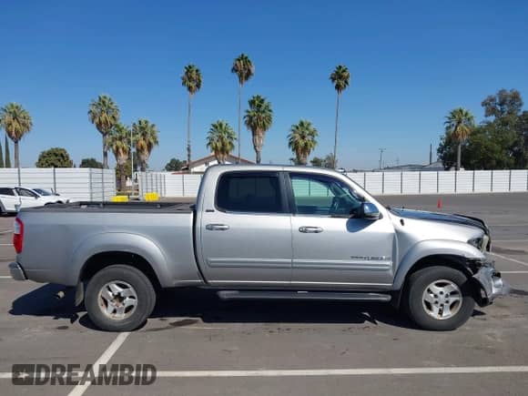 2004 Toyota Tundra SR5 z VIN 5TBDT44154S461290, wystawiony jako IAAI lot #43278955 z przebiegiem 200 462 mil mil oraz . Historia ofert i sprzedaży dostępna na DreamBid. Obrazek 13.