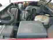 2002 Chevrolet Suburban LT z VIN 1GNEC16Z32J198649, wystawiony jako IAAI lot #42399077 z przebiegiem 242 308 mil mil oraz . Historia ofert i sprzedaży dostępna na DreamBid. Obrazek 14.