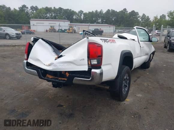 2018 Toyota Tacoma SR5 z VIN 5TFSZ5AN9JX161137, wystawiony jako IAAI lot #42857176 z przebiegiem Nie podano mil oraz . Historia ofert i sprzedaży dostępna na DreamBid. Obrazek 4.