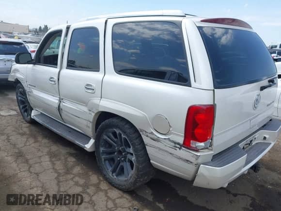2004 Cadillac Escalade with VIN 1GYEC63T54R235754, listed as a IAAI auction lot 43121128 with 105,629 mi miles and . Bid and sale history available at DreamBid. Image 3.