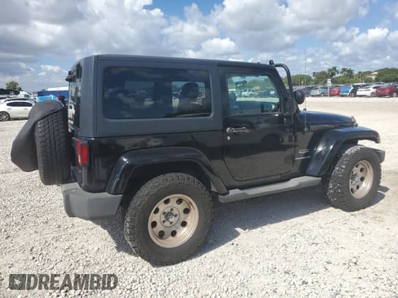 2011 Jeep Wrangler Sahara z VIN 1J4GA5D16BL550388, wystawiony jako Copart lot #82650165 z przebiegiem 197 063 mil mil oraz Czysty tytuł • Clean title. Historia ofert i sprzedaży dostępna na DreamBid. Obrazek 3.