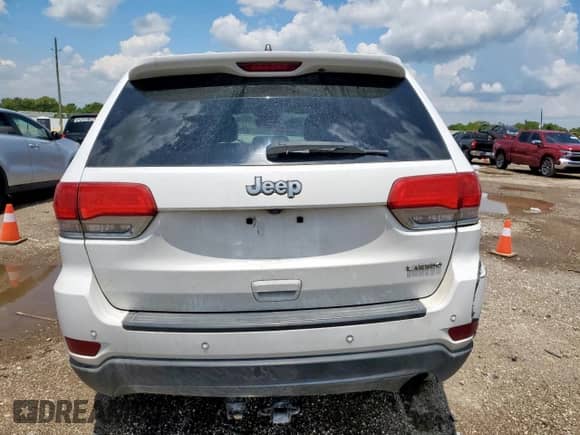 2017 Jeep Grand Cherokee Laredo with VIN 1C4RJEAG2HC614572, listed as a Copart auction lot 67870085 with 123,868 mi miles and Salvage title. Bid and sale history available at DreamBid. Image 6.