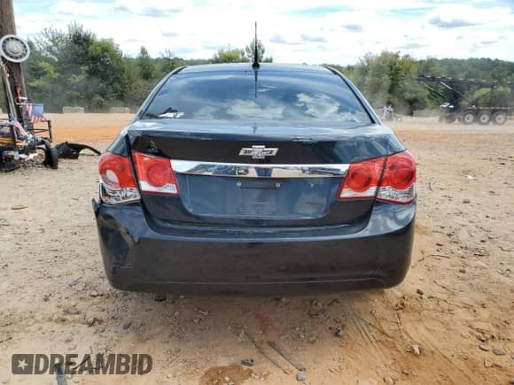 2014 Chevrolet Cruze LS with VIN 1G1PB5SG8E7202978, listed as a Copart auction lot 70787145 with 184,573 mi miles and Salvage title. Bid and sale history available at DreamBid. Image 6.