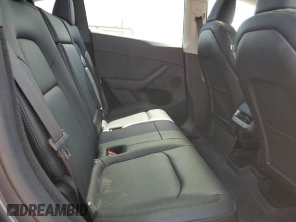 2023 Tesla Model Y Long Range с VIN 7SAYGDEE1PA166467, выставлен на аукционе Copart как лот 60252694 с пробегом 20 216 миль миль и Списание • Salvage title. История ставок и продаж доступна на DreamBid. Изображение 10.