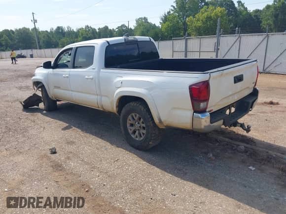 2018 Toyota Tacoma SR5 с VIN 5TFBZ5DN7JX004248, выставлен на аукционе IAAI как лот 42864580 с пробегом 210 482 миль миль и . История ставок и продаж доступна на DreamBid. Изображение 3.