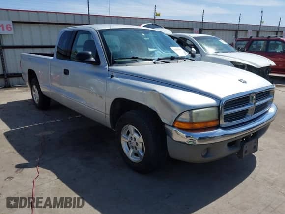 2002 Dodge Dakota SLT с VIN 1B7GL42X72S582306, выставлен на аукционе IAAI как лот 41823338 с пробегом 163 455 миль миль и . История ставок и продаж доступна на DreamBid. Изображение 1.