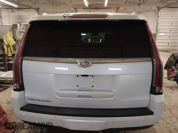 2018 Cadillac Escalade Platinum with VIN 1GYS4DKJ8JR199087, listed as a IAAI auction lot 42062074 with 97,751 mi miles and . Bid and sale history available at DreamBid. Image 17.