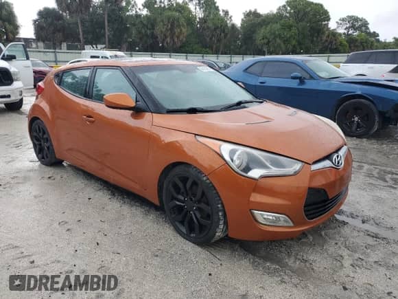 2012 Hyundai Veloster w/Gray Int z VIN KMHTC6AD9CU029014, wystawiony jako Copart lot #86150035 z przebiegiem 112 162 mil mil oraz Szkoda całkowita • Salvage title. Historia ofert i sprzedaży dostępna na DreamBid. Obrazek 4.