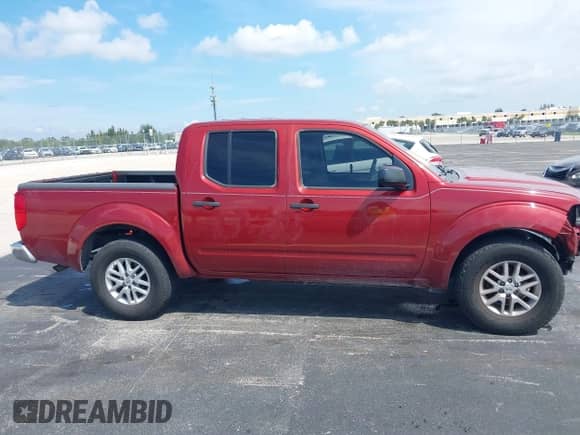 2019 Nissan Frontier SV with VIN 1N6AD0ERXKN775263, listed as a IAAI auction lot 43166750 with 154,012 mi miles and . Bid and sale history available at DreamBid. Image 13.