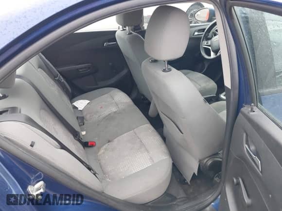 2014 Chevrolet Sonic LS with VIN 1G1JA5SH0E4142360, listed as a IAAI auction lot 43164934 with 114,869 mi miles and . Bid and sale history available at DreamBid. Image 8.