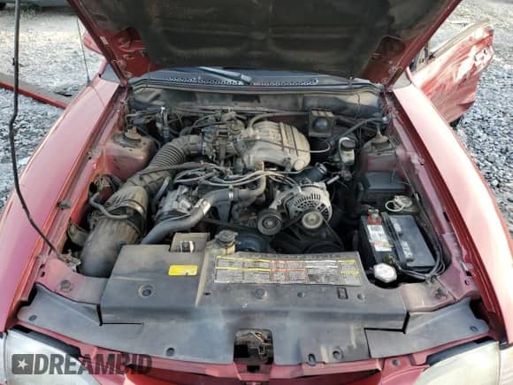 1994 Ford Mustang z VIN 1FALP4049RF150529, wystawiony jako Copart lot #48106225 z przebiegiem 95 308 mil mil oraz Szkoda całkowita • Salvage title. Historia ofert i sprzedaży dostępna na DreamBid. Obrazek 11.