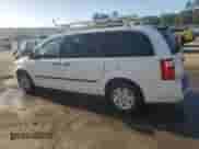 2009 Dodge Grand Caravan Cargo with VIN 2D4HN11E09R685028, listed as a Copart auction lot 77095054 with 240,140 mi miles and Salvage title. Bid and sale history available at DreamBid. Image 2.