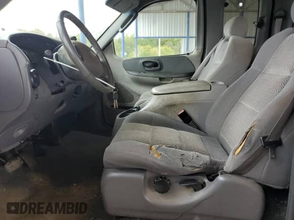 2003 Ford F-150 XL with VIN 2FTRX17203CA61104, listed as a Copart auction lot 83854135 with Not provided miles and Salvage title. Bid and sale history available at DreamBid. Image 7.