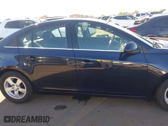 2015 Chevrolet Cruze LT z VIN 1G1PC5SB9F7107445, wystawiony jako IAAI lot #43551061 z przebiegiem 93 555 mil mil oraz . Historia ofert i sprzedaży dostępna na DreamBid. Obrazek 13.