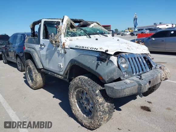 2013 Jeep Wrangler Rubicon 10th Anniversary with VIN 1C4BJWCG4DL533216, listed as a IAAI auction lot 42323743 with Not provided miles and . Bid and sale history available at DreamBid. Image 1.
