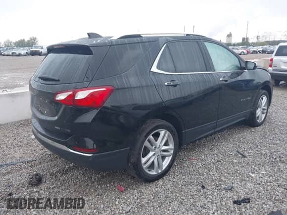 2018 Chevrolet Equinox Premier with VIN 2GNAXVEV8J6207981, listed as a IAAI auction lot 43276759 with 90,288 mi miles and . Bid and sale history available at DreamBid. Image 4.