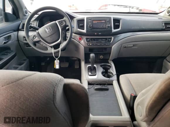 2017 Honda Pilot LX z VIN 5FNYF5H13HB011826, wystawiony jako Copart lot #82974294 z przebiegiem 116 451 mil mil oraz Szkoda całkowita • Salvage title. Historia ofert i sprzedaży dostępna na DreamBid. Obrazek 8.