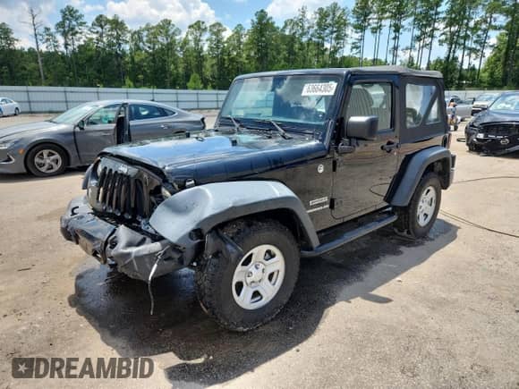 2015 Jeep Wrangler Sport with VIN 1C4AJWAG0FL749503, listed as a Copart auction lot 63664305 with 61,771 mi miles and Salvage title. Bid and sale history available at DreamBid. Image 1.