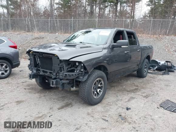 2018 Ram 1500 Rebel z VIN 1C6RR7YT2JS134820, wystawiony jako IAAI lot #40931182 z przebiegiem 56 427 mil mil oraz . Historia ofert i sprzedaży dostępna na DreamBid. Obrazek 2.