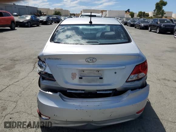 2014 Hyundai Accent GLS z VIN KMHCU4AEXEU624371, wystawiony jako Copart lot #66858945 z przebiegiem 199 501 mil mil oraz Szkoda całkowita • Salvage title. Historia ofert i sprzedaży dostępna na DreamBid. Obrazek 6.