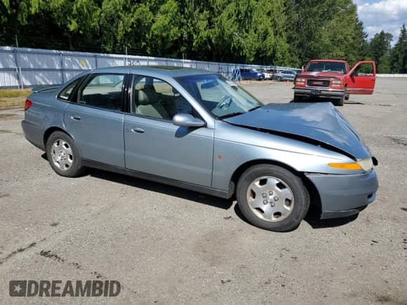 2002 Saturn LS with VIN 1G8JW54RX2Y538650, listed as a Copart auction lot 58325395 with 83,888 mi miles and Salvage title. Bid and sale history available at DreamBid. Image 4.