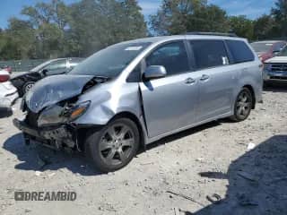 2017 Toyota Sienna SE with VIN 5TDXZ3DC8HS795298, listed as a Copart auction lot 82170705 with 102,445 mi miles and Salvage title. Bid and sale history available at DreamBid. Image 1.