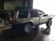 1998 Jeep Grand Cherokee Limited z VIN 1J4GZ78S9WC308708, wystawiony jako Copart lot #79315694 z przebiegiem 205 976 mil mil oraz Szkoda całkowita • Salvage title. Historia ofert i sprzedaży dostępna na DreamBid. Obrazek 3.