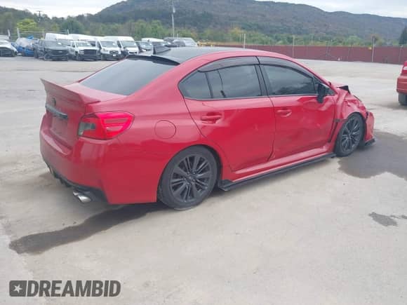 2015 Subaru WRX Premium with VIN JF1VA1D67F9822974, listed as a IAAI auction lot 43365301 with 98,803 mi miles and . Bid and sale history available at DreamBid. Image 4.